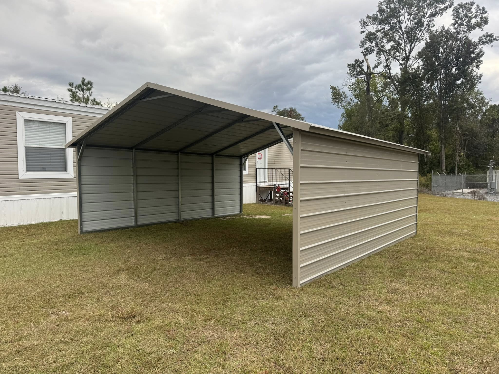 20x20x7 Box Eav Style Carport (2 Sides Enclosed)